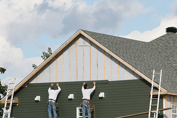 Professional Storm Damage Siding Repair technician working in Marianna, PA